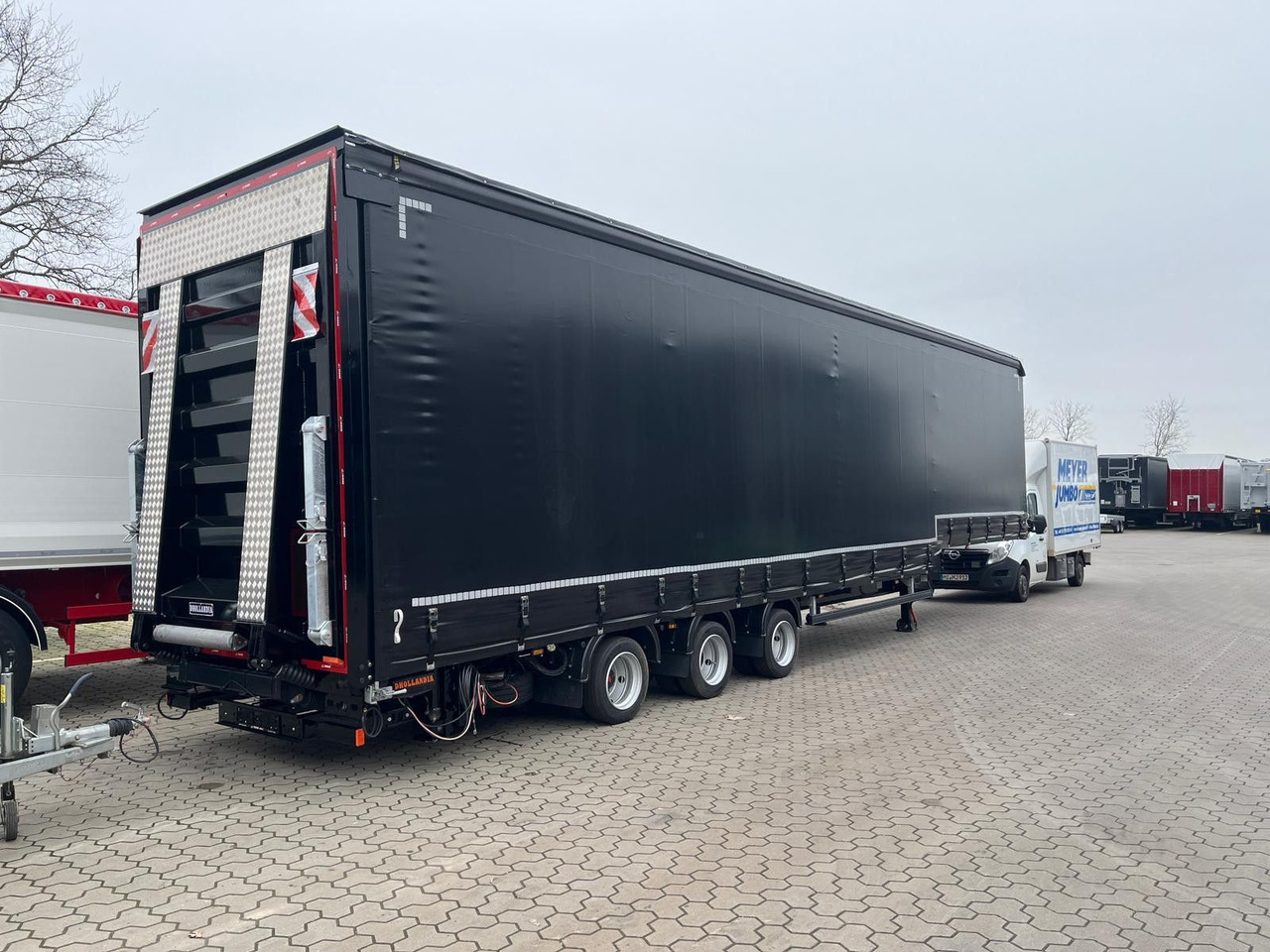 Wiese Gabelstaplertransporter Mega mit Rampen - Alçak çerçeveli platform dorse: fotoğraf 1 Wiese Gabelstaplertransporter Mega mit Rampen - Alçak çerçeveli platform dorse: fotoğraf 1