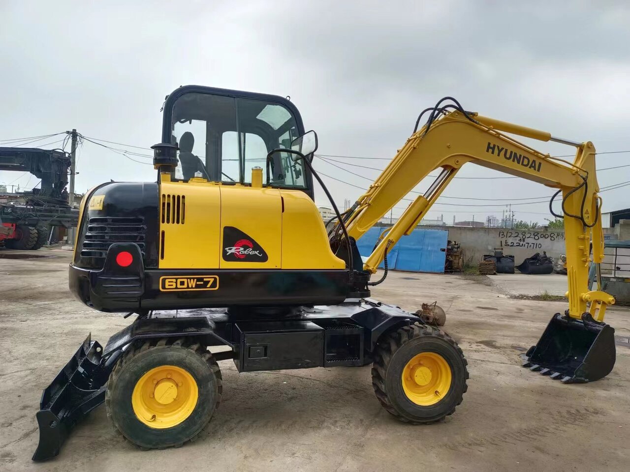 HYUNDAI 60W-7 - Tekerlekli ekskavatör: fotoğraf 3 HYUNDAI 60W-7 - Tekerlekli ekskavatör: fotoğraf 3