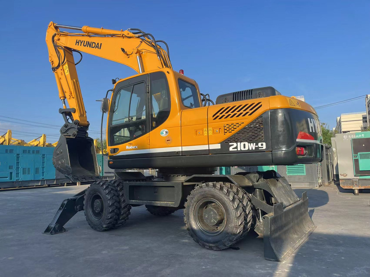 Hyundai R210W-9 - Tekerlekli ekskavatör: fotoğraf 5 Hyundai R210W-9 - Tekerlekli ekskavatör: fotoğraf 5
