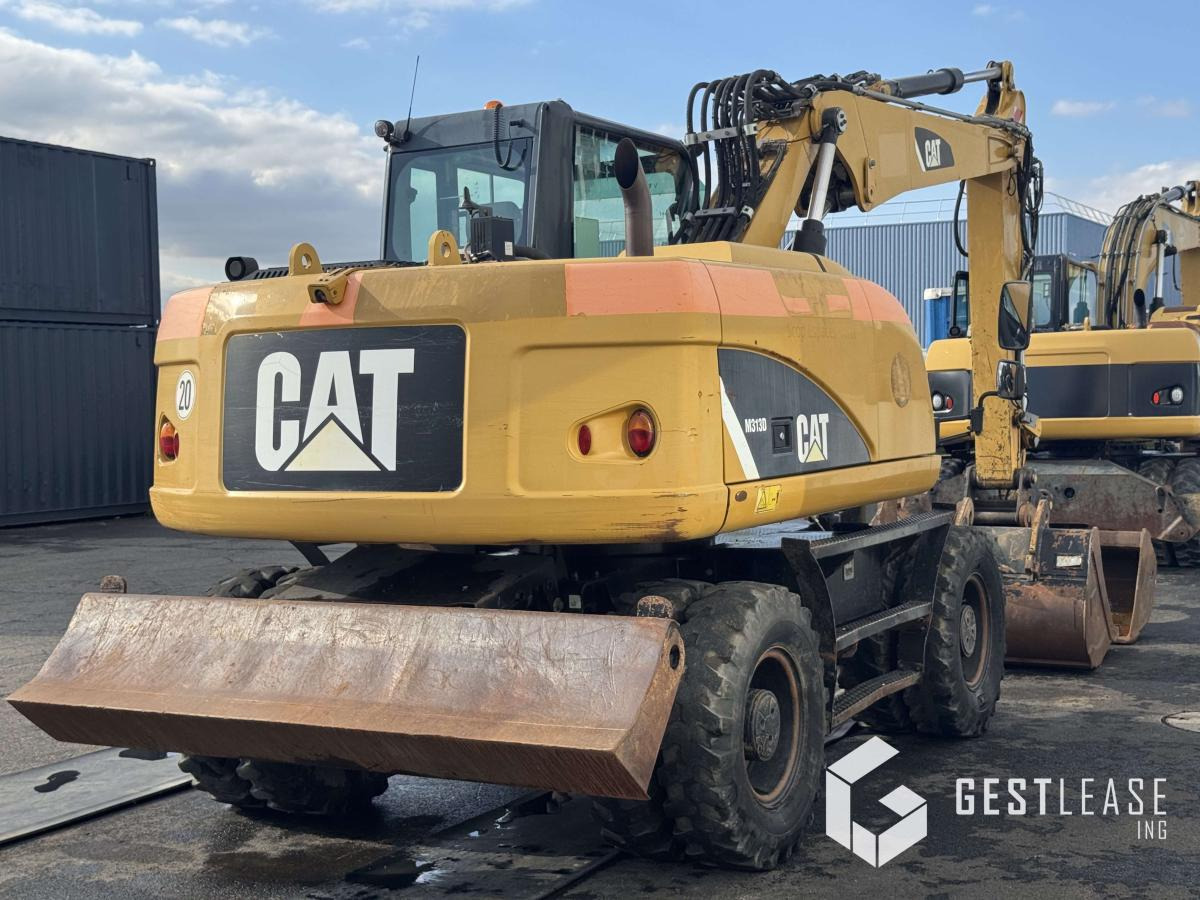 Caterpillar M313D - Tekerlekli ekskavatör: fotoğraf 3 Caterpillar M313D - Tekerlekli ekskavatör: fotoğraf 3