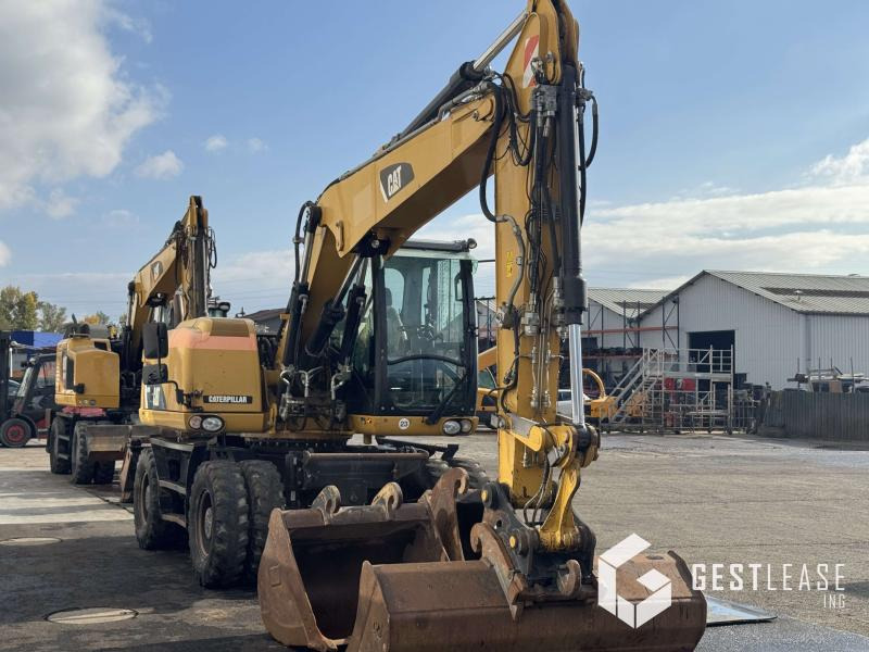 Caterpillar M313D - Tekerlekli ekskavatör: fotoğraf 4 Caterpillar M313D - Tekerlekli ekskavatör: fotoğraf 4