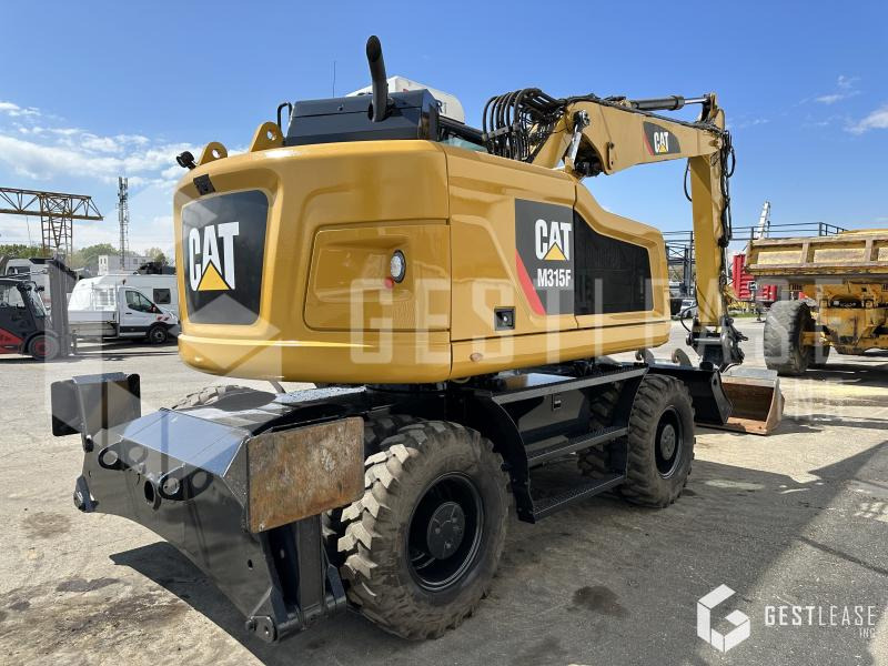 Caterpillar M315F - Tekerlekli ekskavatör: fotoğraf 3 Caterpillar M315F - Tekerlekli ekskavatör: fotoğraf 3