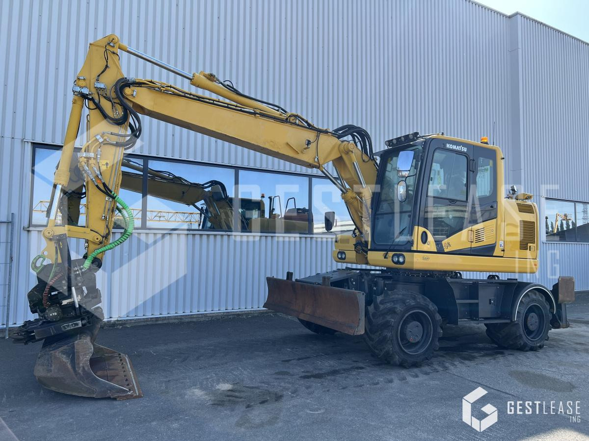 Komatsu PW148-11 - Tekerlekli ekskavatör: fotoğraf 1 Komatsu PW148-11 - Tekerlekli ekskavatör: fotoğraf 1