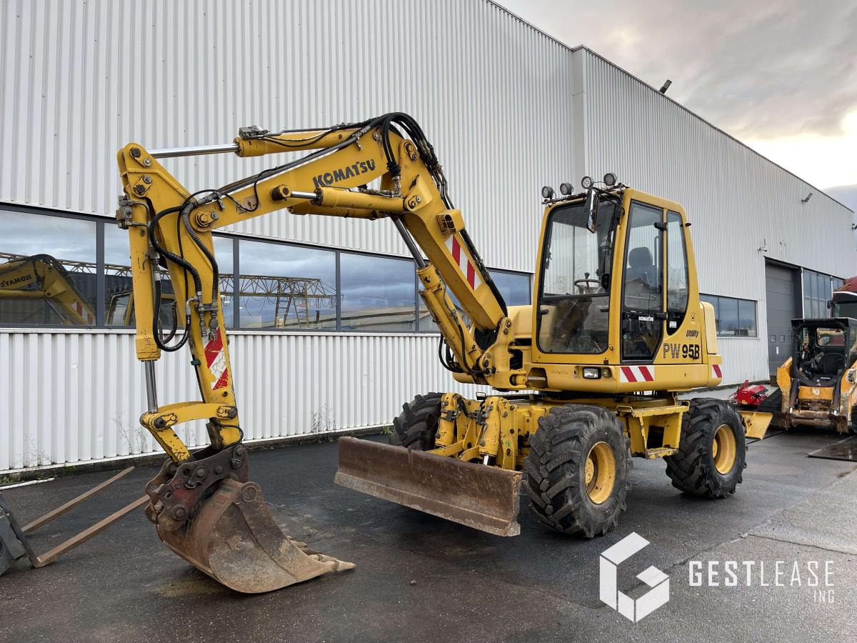 Komatsu PW95 - Tekerlekli ekskavatör: fotoğraf 1 Komatsu PW95 - Tekerlekli ekskavatör: fotoğraf 1