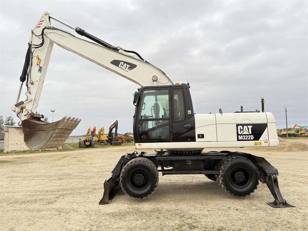 CAT M 322 D , 3D Trimble ready - Tekerlekli ekskavatör: fotoğraf 1 CAT M 322 D , 3D Trimble ready - Tekerlekli ekskavatör: fotoğraf 1