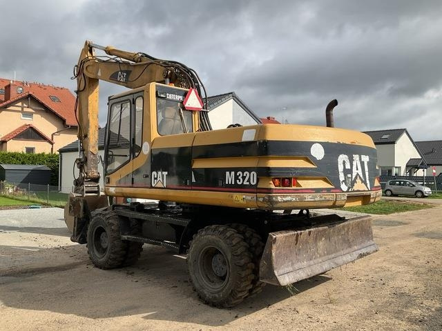 CAT M320 - Tekerlekli ekskavatör: fotoğraf 3 CAT M320 - Tekerlekli ekskavatör: fotoğraf 3