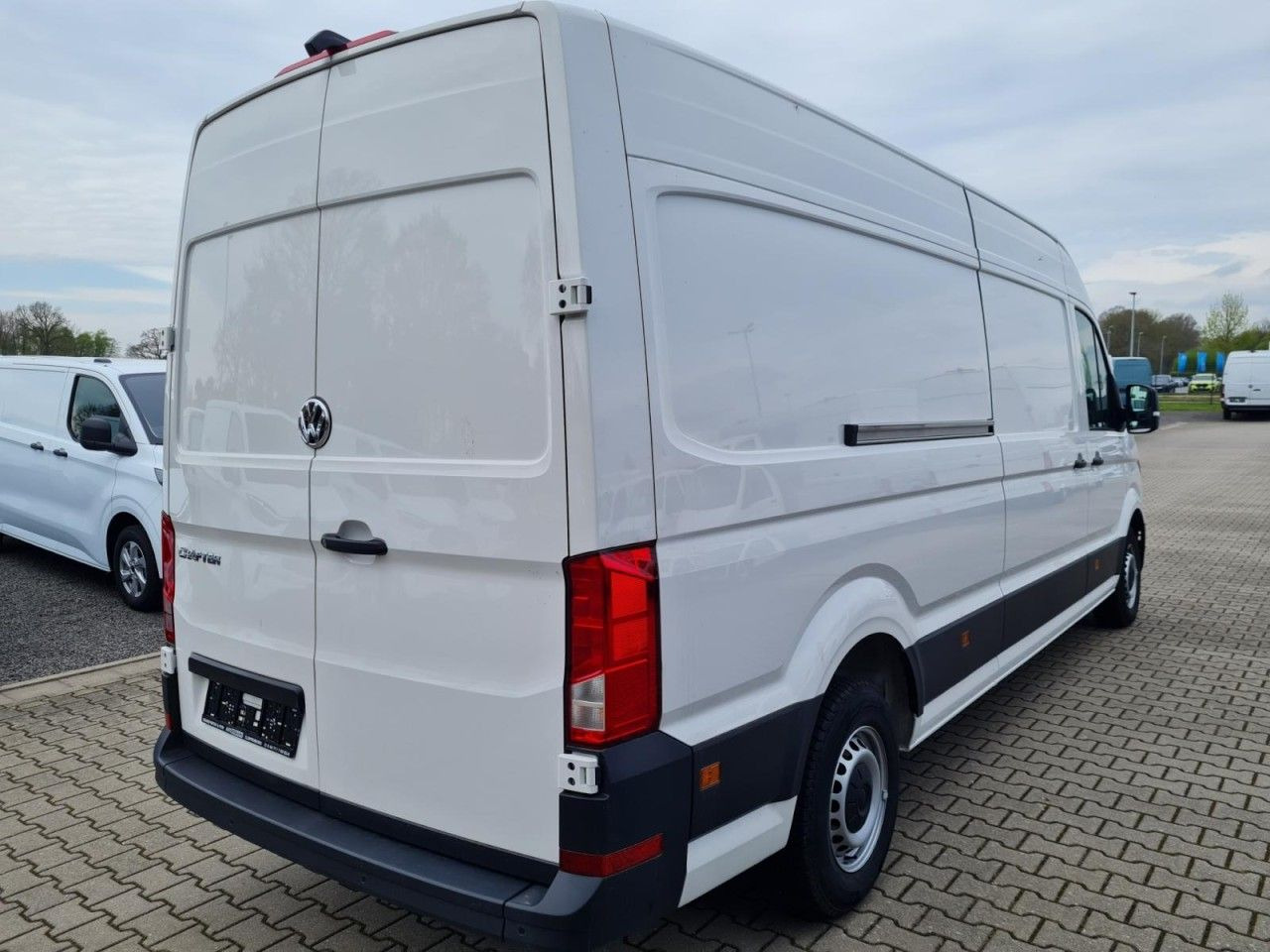 Volkswagen Crafter 35 Kasten lang L4H2 KLIMA NAVI_APP HOLZB - Panelvan: fotoğraf 4 Volkswagen Crafter 35 Kasten lang L4H2 KLIMA NAVI_APP HOLZB - Panelvan: fotoğraf 4