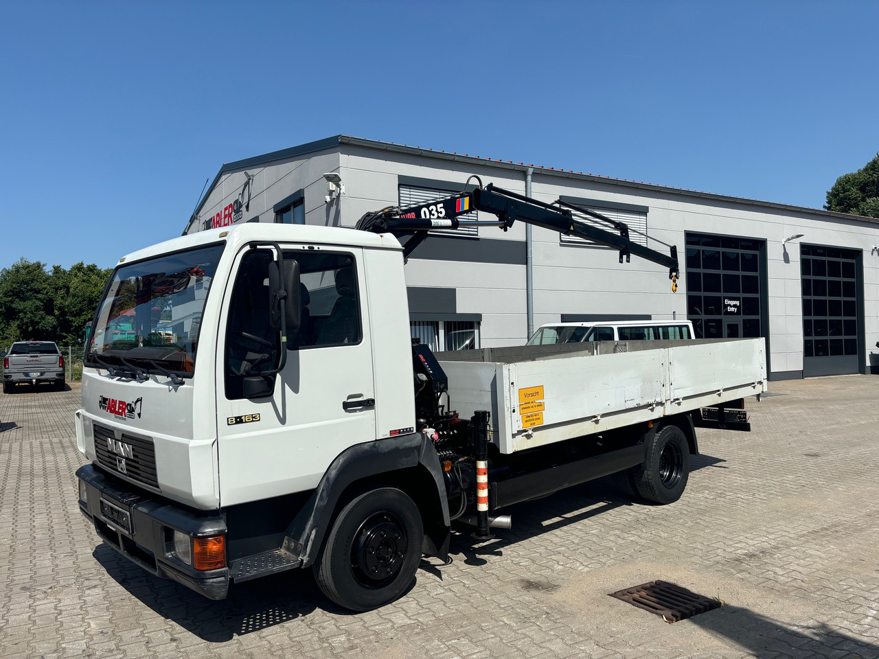 MAN 8.163 L2000 Pritsche+Kran Hiab 035 - Sal/ Açık kasa kamyon, Vinçli kamyon: fotoğraf 3 MAN 8.163 L2000 Pritsche+Kran Hiab 035 - Sal/ Açık kasa kamyon, Vinçli kamyon: fotoğraf 3