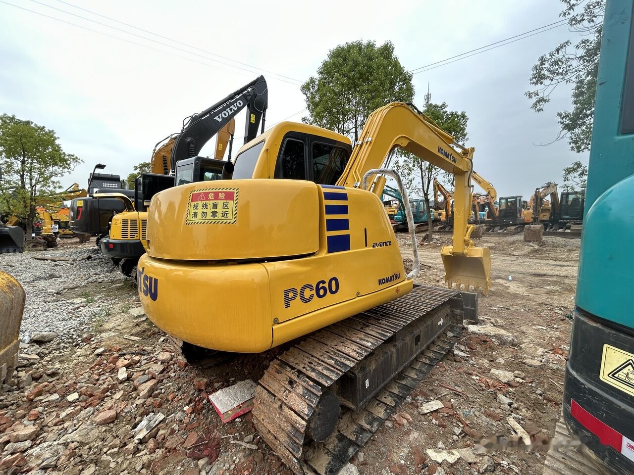Komatsu PC60 - Paletli ekskavatör: fotoğraf 1 Komatsu PC60 - Paletli ekskavatör: fotoğraf 1