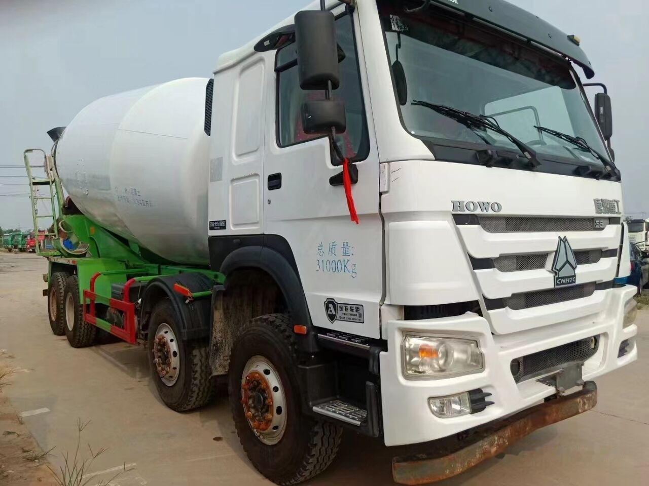 Sinotruk HOWO 8*4 Concrete mixer truck - Transmikser: fotoğraf 2 Sinotruk HOWO 8*4 Concrete mixer truck - Transmikser: fotoğraf 2