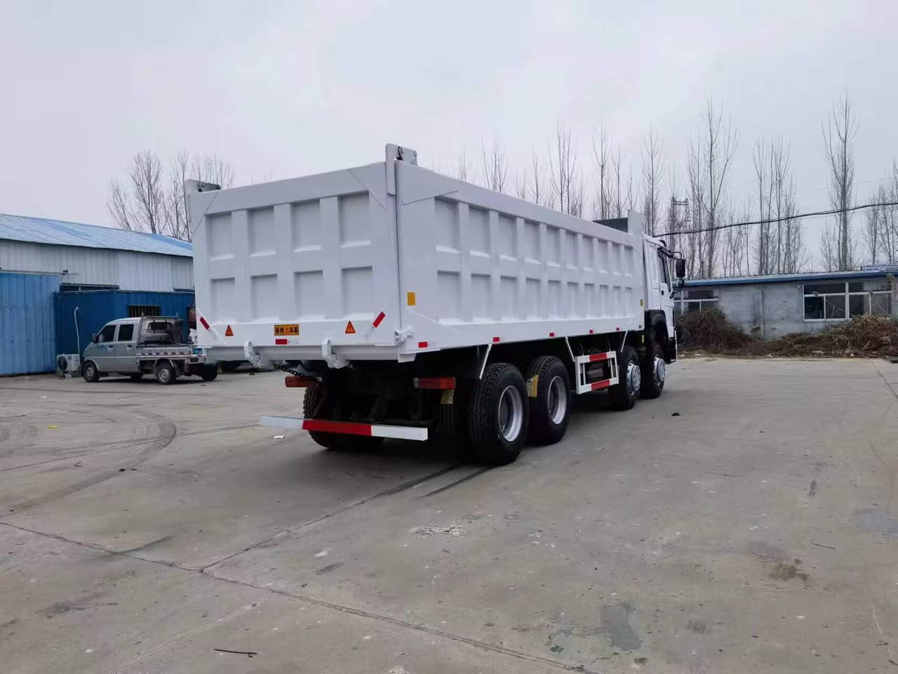SINOTRUK HOWO 8*4 6*4 dump truck - Damperli kamyon: fotoğraf 4 SINOTRUK HOWO 8*4 6*4 dump truck - Damperli kamyon: fotoğraf 4