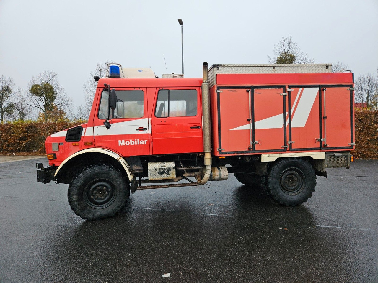 Unimog U4000 4x4 DOKA Tanklöschfahrzeug Feuerwehr - Tanker kamyon: fotoğraf 2 Unimog U4000 4x4 DOKA Tanklöschfahrzeug Feuerwehr - Tanker kamyon: fotoğraf 2