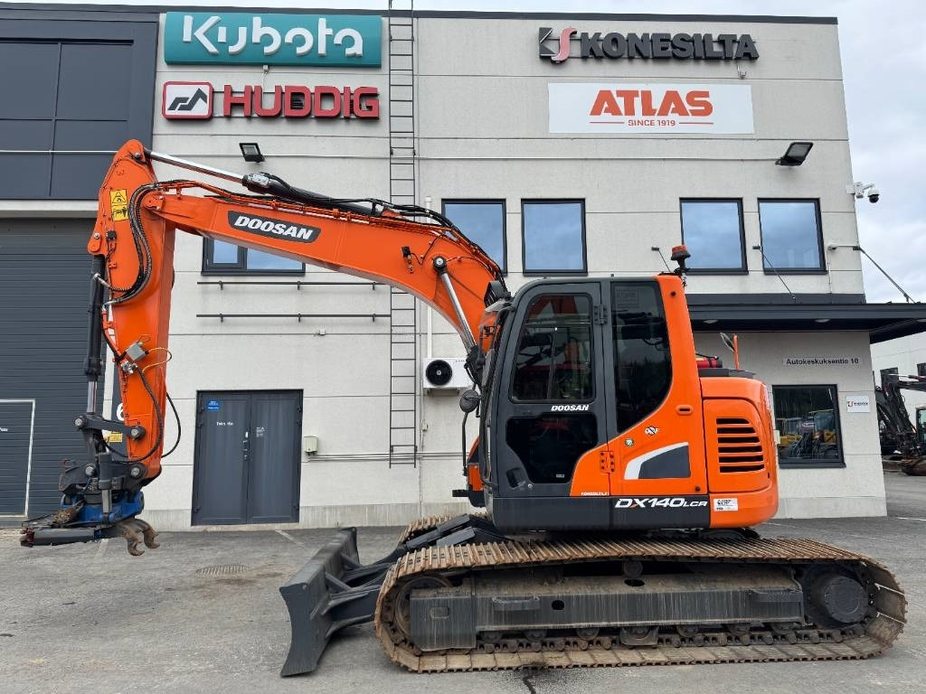 Doosan DX 140 LCR-5 Pyörittäjällä - Paletli ekskavatör: fotoğraf 1 Doosan DX 140 LCR-5 Pyörittäjällä - Paletli ekskavatör: fotoğraf 1