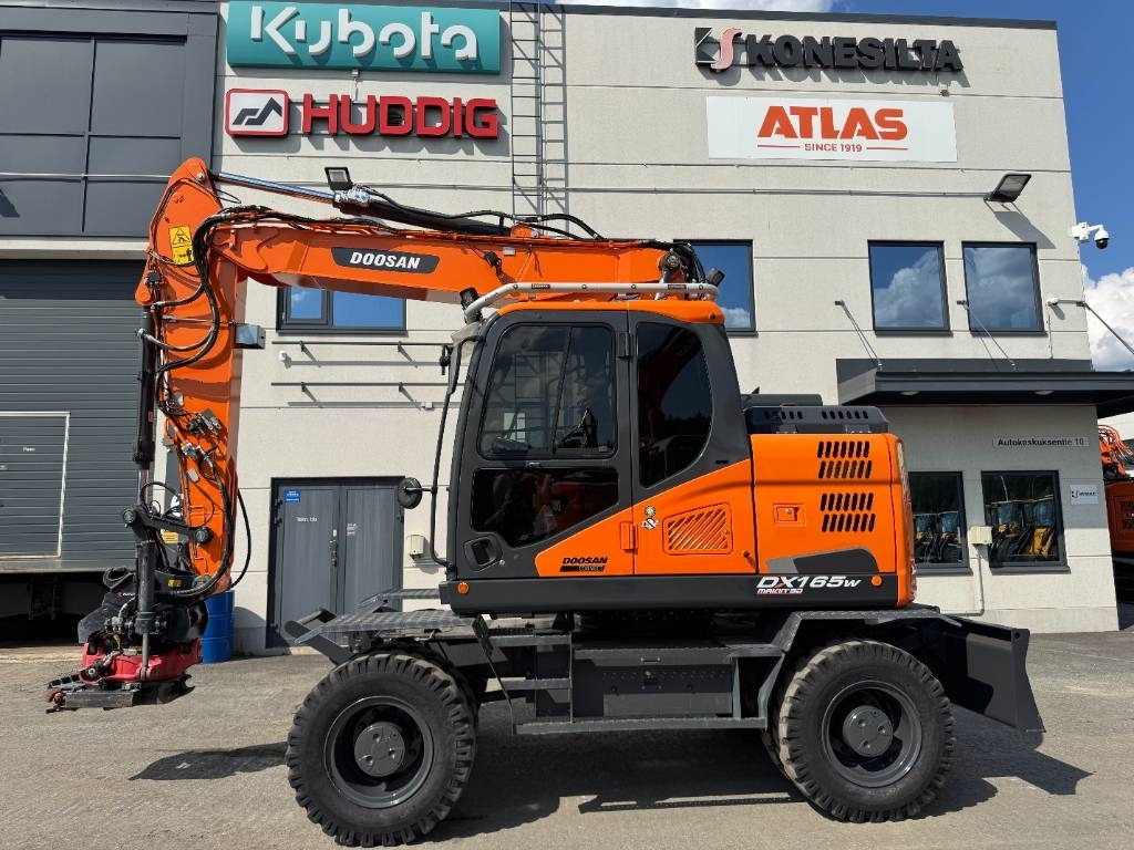 Doosan DX165W-5 PYÖRITTÄJÄLLÄ - Tekerlekli ekskavatör: fotoğraf 1 Doosan DX165W-5 PYÖRITTÄJÄLLÄ - Tekerlekli ekskavatör: fotoğraf 1
