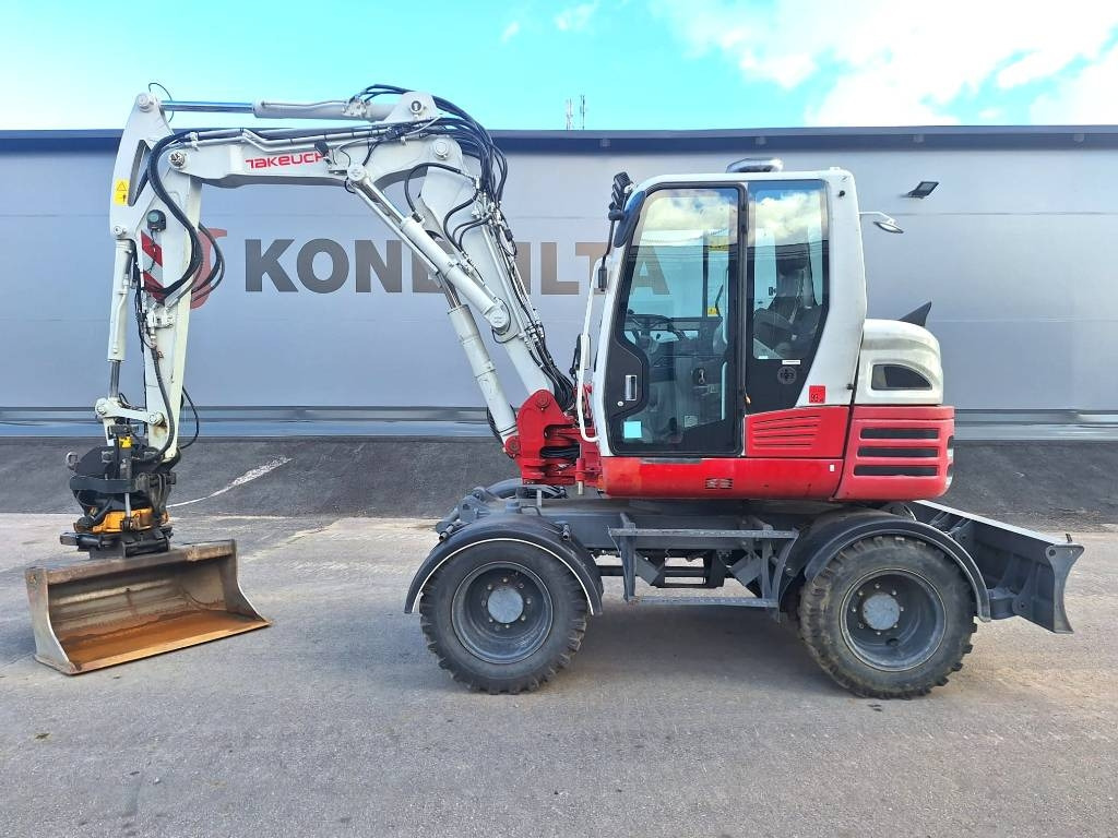 Takeuchi TB295W PYÖRITTÄJÄLLÄ - Tekerlekli ekskavatör: fotoğraf 1 Takeuchi TB295W PYÖRITTÄJÄLLÄ - Tekerlekli ekskavatör: fotoğraf 1