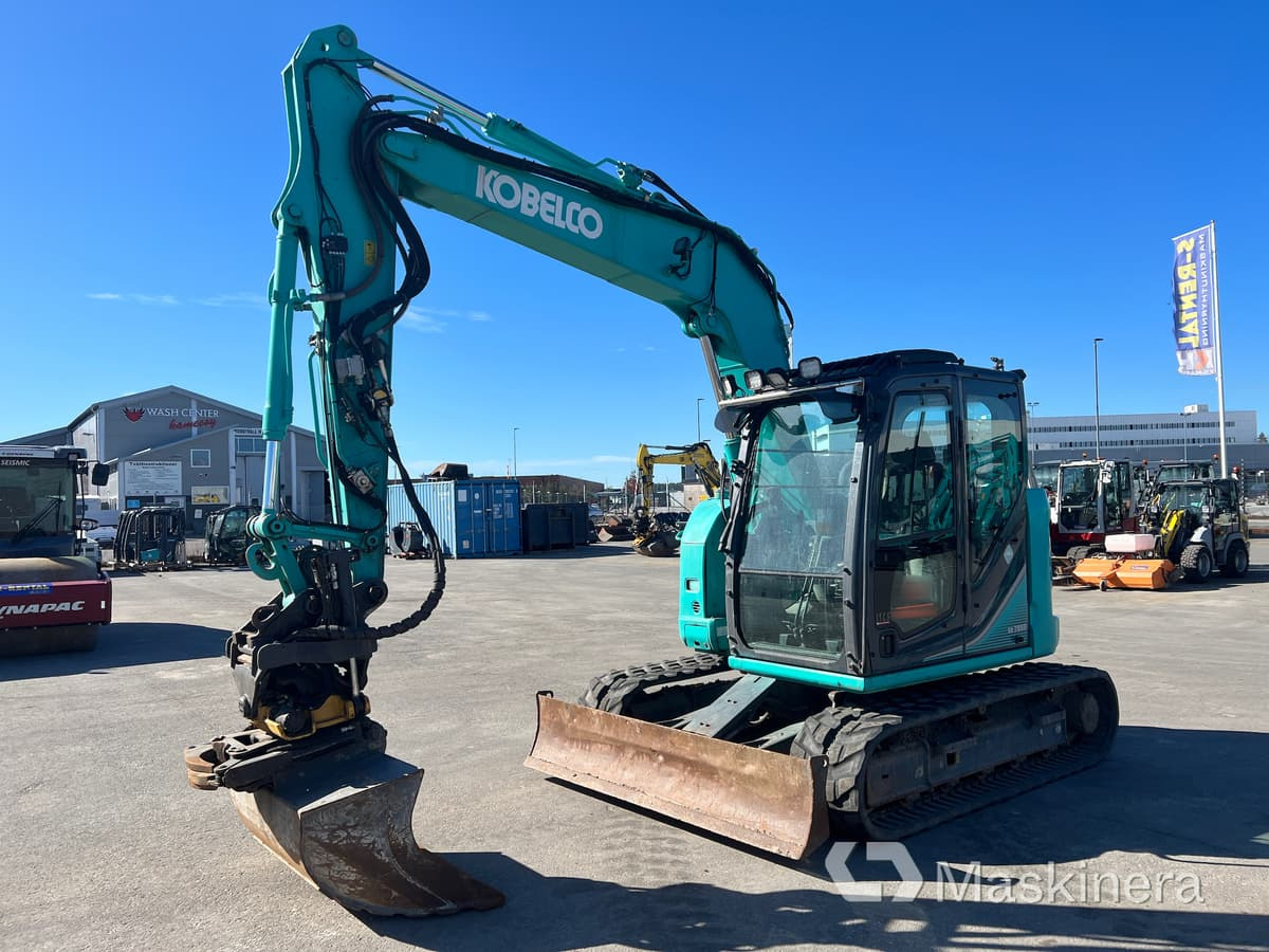 Grävmaskin Kobelco SK75SR-3E - Paletli ekskavatör: fotoğraf 1 Grävmaskin Kobelco SK75SR-3E - Paletli ekskavatör: fotoğraf 1