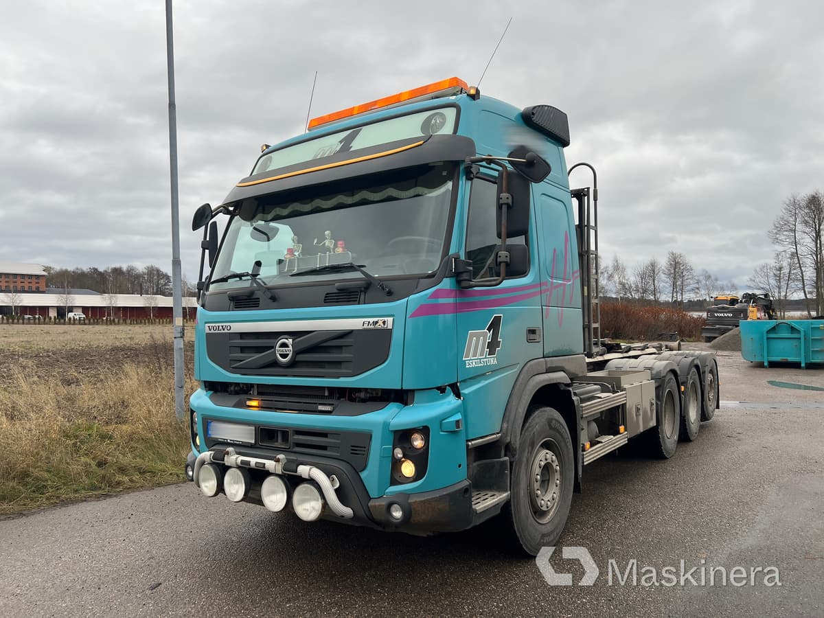 Lastväxlare Volvo FMX 460 D13 8X4 - Kancalı yükleyici kamyon: fotoğraf 1 Lastväxlare Volvo FMX 460 D13 8X4 - Kancalı yükleyici kamyon: fotoğraf 1