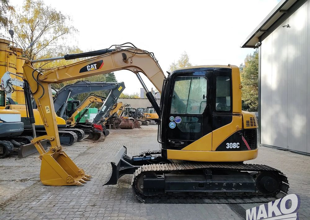 Caterpillar 308C - Paletli ekskavatör: fotoğraf 1 Caterpillar 308C - Paletli ekskavatör: fotoğraf 1