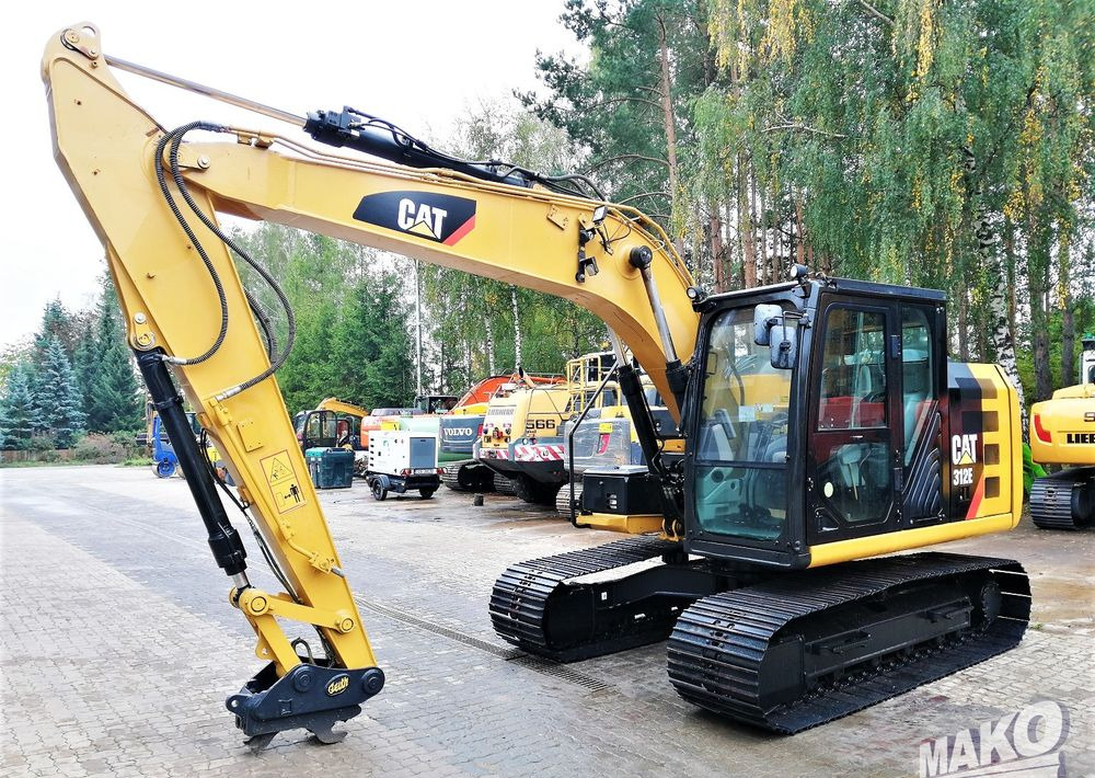 Caterpillar 312E - Paletli ekskavatör: fotoğraf 1 Caterpillar 312E - Paletli ekskavatör: fotoğraf 1