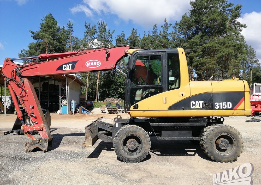 Caterpillar M315 C - Tekerlekli ekskavatör: fotoğraf 2 Caterpillar M315 C - Tekerlekli ekskavatör: fotoğraf 2
