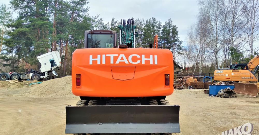 Hitachi ZX140W-3 - Tekerlekli ekskavatör: fotoğraf 3 Hitachi ZX140W-3 - Tekerlekli ekskavatör: fotoğraf 3