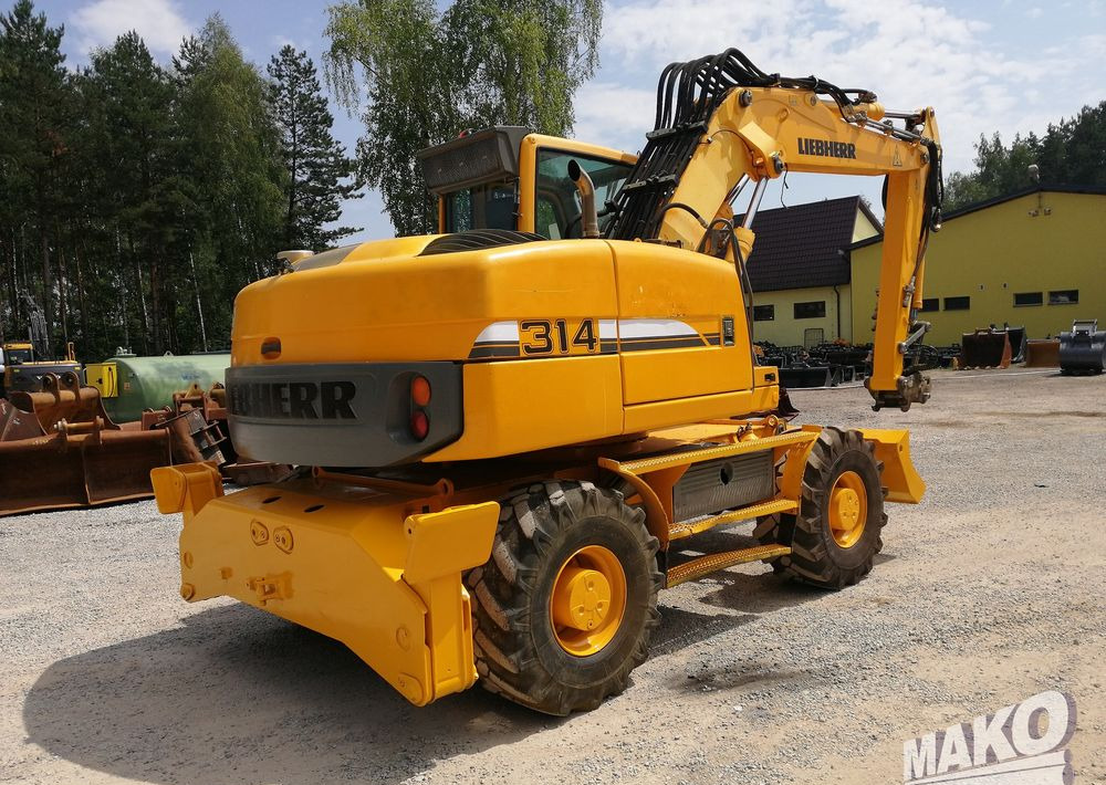 Liebherr A 314 Litronic - Tekerlekli ekskavatör: fotoğraf 5 Liebherr A 314 Litronic - Tekerlekli ekskavatör: fotoğraf 5