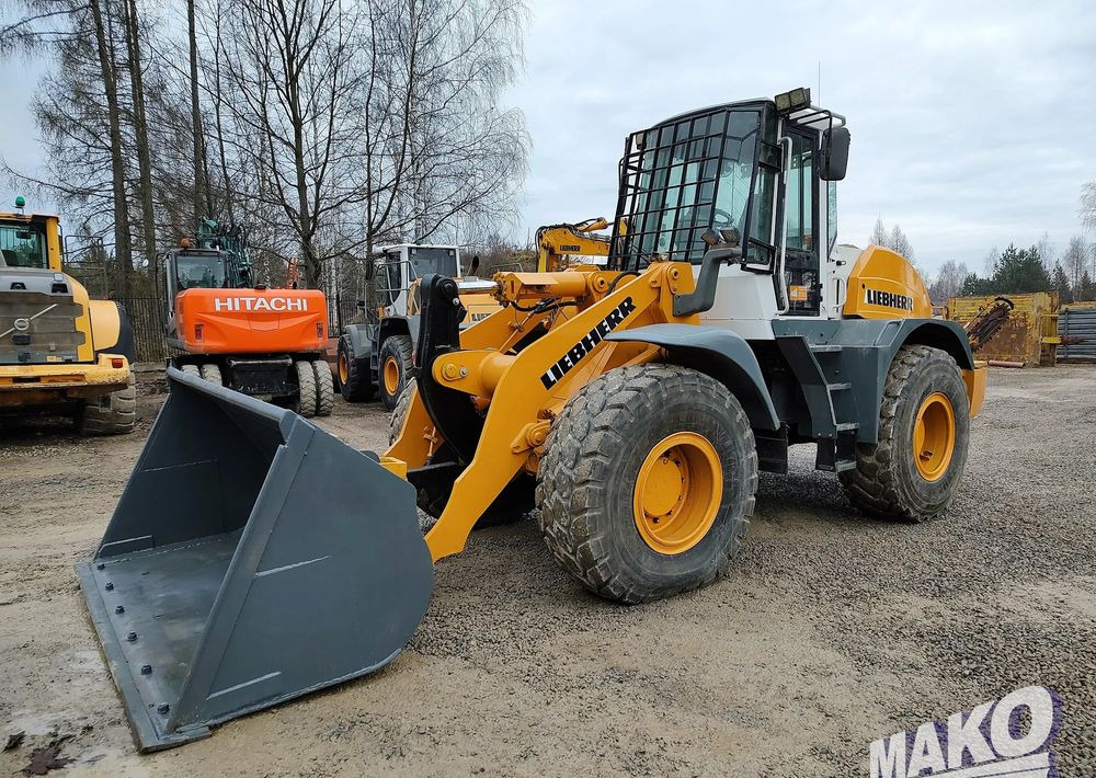 Liebherr L534 - Tekerlekli yükleyici: fotoğraf 1 Liebherr L534 - Tekerlekli yükleyici: fotoğraf 1