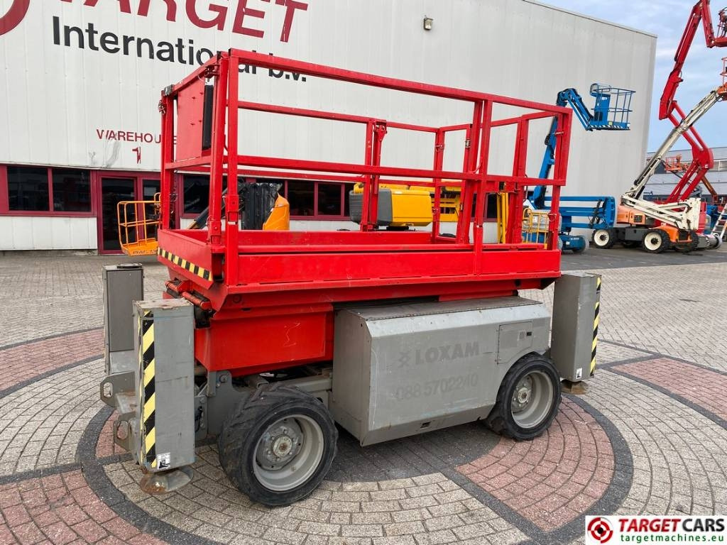 Genie GS-2668RT Diesel 4x4 Scissor Work Lift 992cm - Makasli platform: fotoğraf 1 Genie GS-2668RT Diesel 4x4 Scissor Work Lift 992cm - Makasli platform: fotoğraf 1