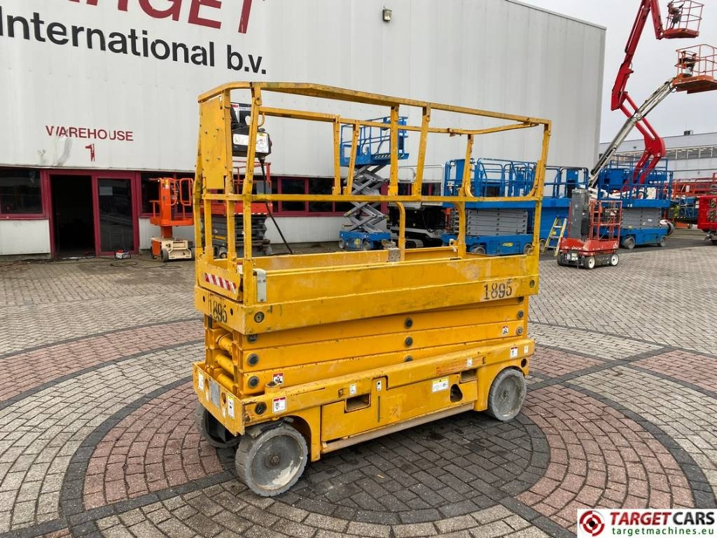 Haulotte Compact 10N Electric Scissor Work Lift 1000cm - Makasli platform: fotoğraf 1 Haulotte Compact 10N Electric Scissor Work Lift 1000cm - Makasli platform: fotoğraf 1