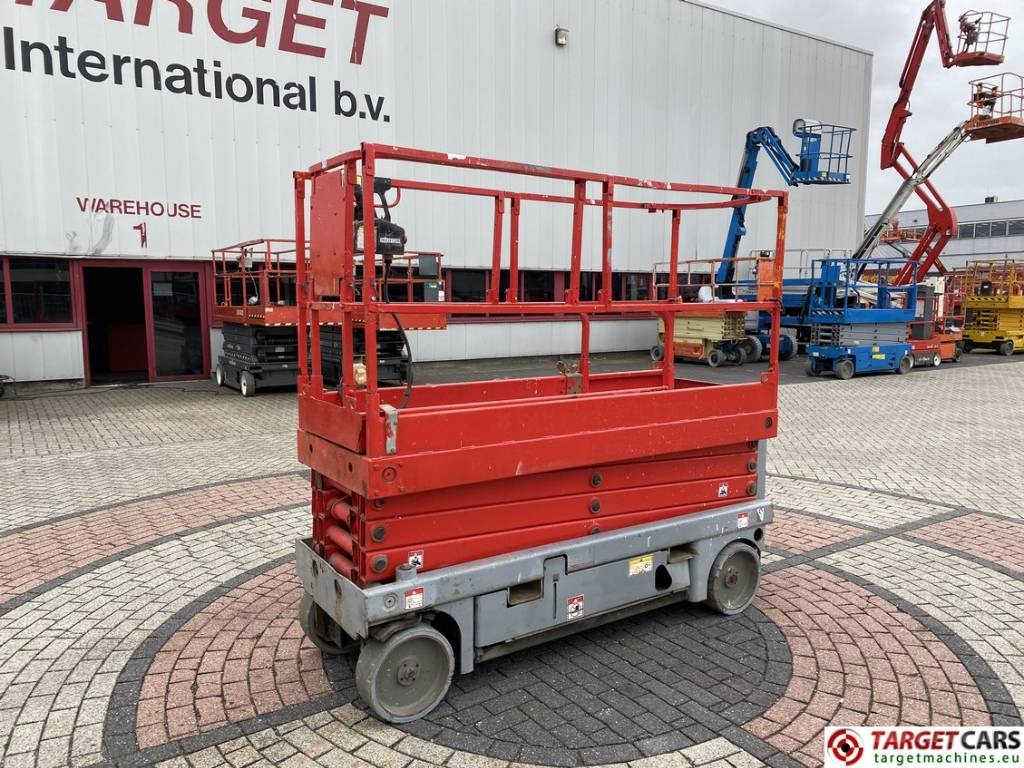 Haulotte Compact 10N Electric Scissor Work Lift 1000cm - Makasli platform: fotoğraf 1 Haulotte Compact 10N Electric Scissor Work Lift 1000cm - Makasli platform: fotoğraf 1