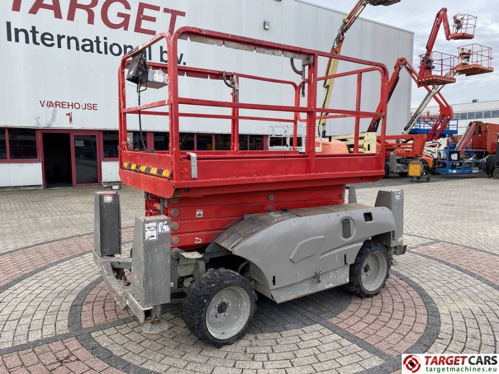 Haulotte Compact 12DX Diesel 4x4 Scissor Work Lift 1206cm - Makasli platform: fotoğraf 1 Haulotte Compact 12DX Diesel 4x4 Scissor Work Lift 1206cm - Makasli platform: fotoğraf 1