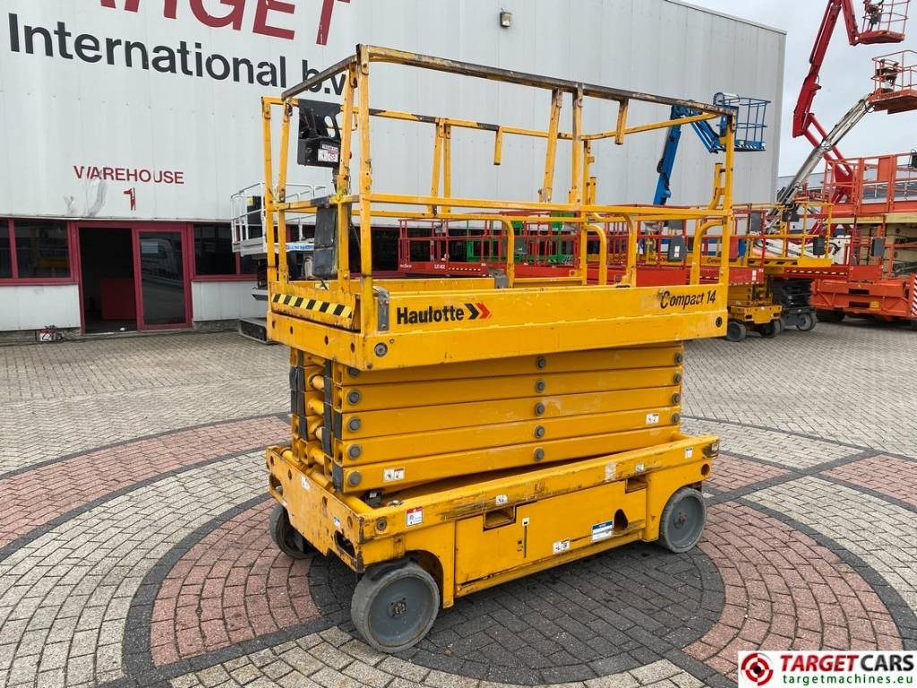Haulotte Compact 14 Electric Scissor Work Lift 1385cm - Makasli platform: fotoğraf 1 Haulotte Compact 14 Electric Scissor Work Lift 1385cm - Makasli platform: fotoğraf 1
