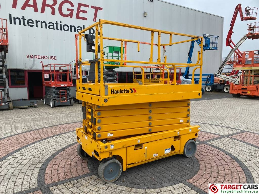 Haulotte Compact 14 Electric Scissor Work Lift 1385cm - Makasli platform: fotoğraf 1 Haulotte Compact 14 Electric Scissor Work Lift 1385cm - Makasli platform: fotoğraf 1