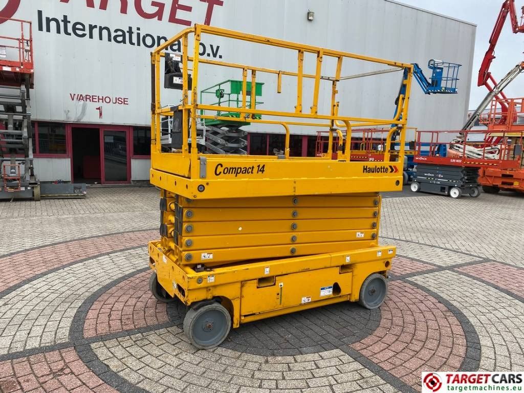 Haulotte Compact 14 Electric Scissor Work Lift 1385cm - Makasli platform: fotoğraf 1 Haulotte Compact 14 Electric Scissor Work Lift 1385cm - Makasli platform: fotoğraf 1
