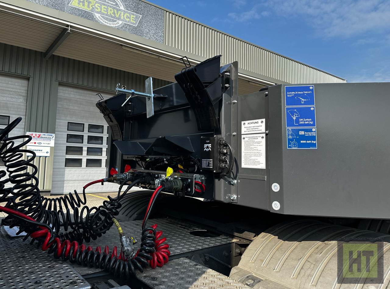 Meusburger 3-Achs-Tele-Semi mit 1 Paar Radmulden und hydr. Rampen - Alçak çerçeveli platform dorse: fotoğraf 2 Meusburger 3-Achs-Tele-Semi mit 1 Paar Radmulden und hydr. Rampen - Alçak çerçeveli platform dorse: fotoğraf 2