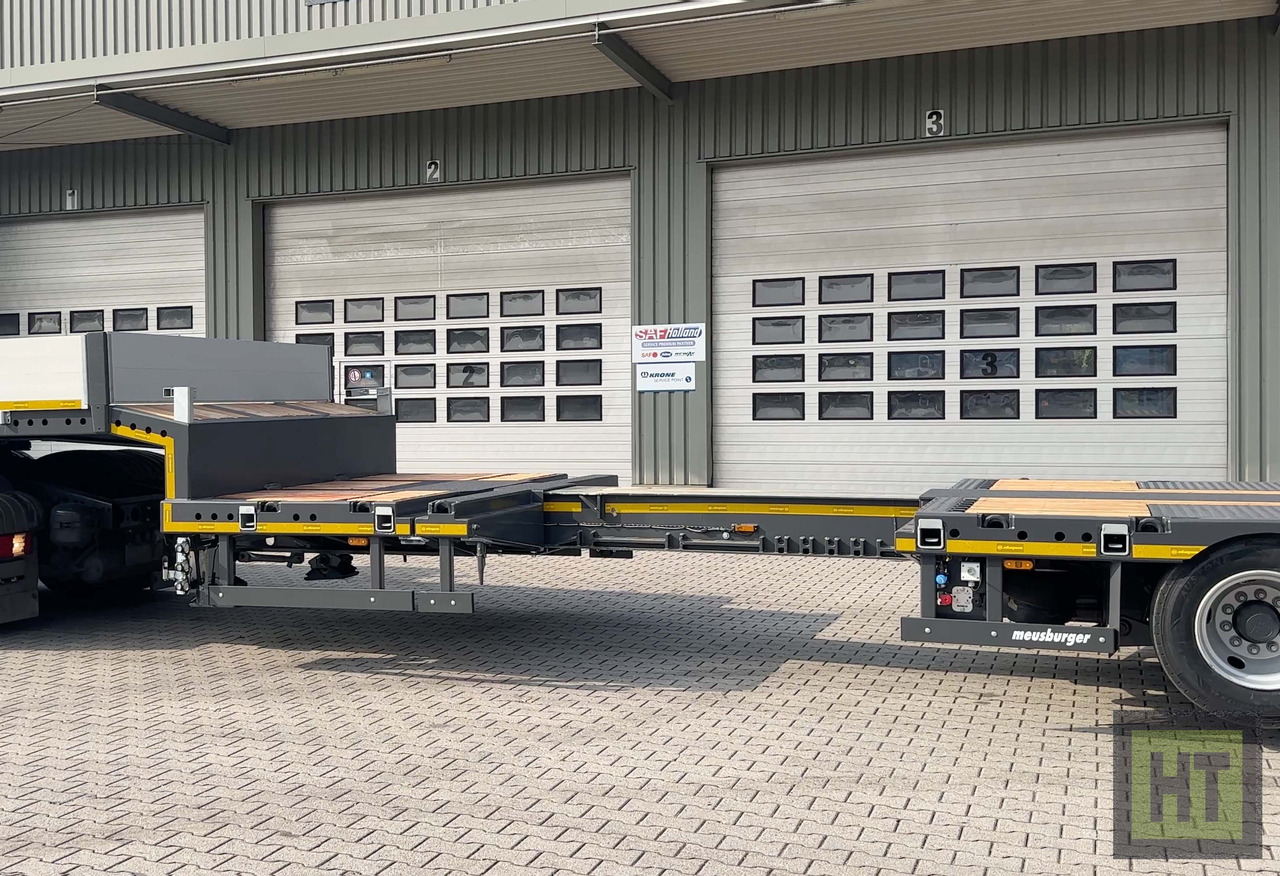 Meusburger 3-Achs-Tele-Semi mit 1 Paar Radmulden und hydr. Rampen - Alçak çerçeveli platform dorse: fotoğraf 4 Meusburger 3-Achs-Tele-Semi mit 1 Paar Radmulden und hydr. Rampen - Alçak çerçeveli platform dorse: fotoğraf 4
