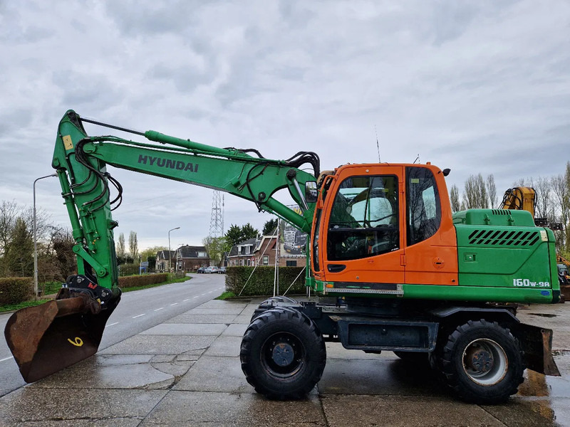 Hyundai Robex 160W-9A met 6-cilinder Cummins motor - Tekerlekli ekskavatör: fotoğraf 1 Hyundai Robex 160W-9A met 6-cilinder Cummins motor - Tekerlekli ekskavatör: fotoğraf 1