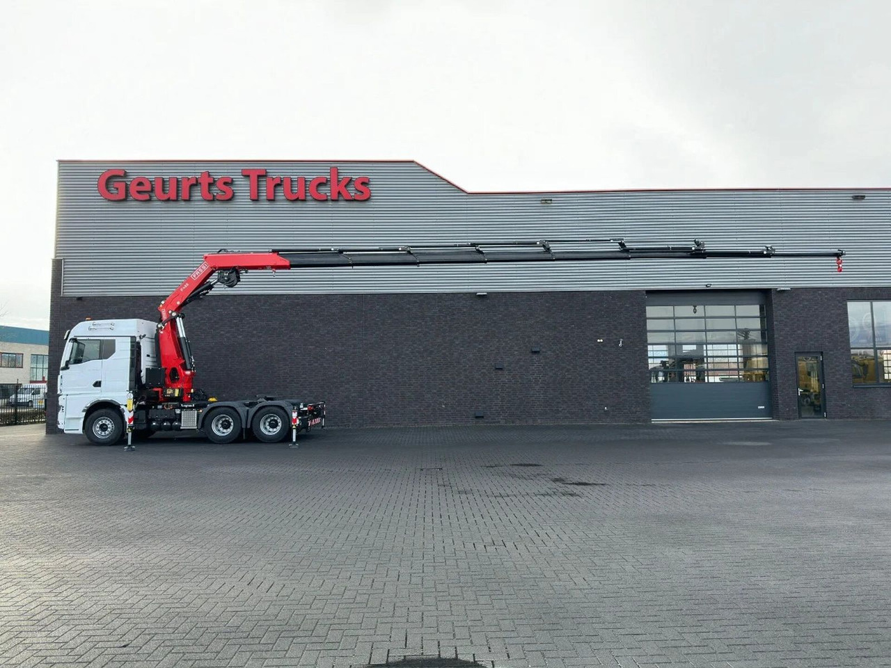 MAN TGX 33.520 6X4 TREKKER-BAKWAGEN COMBI + FASSI F4 - Vinçli kamyon: fotoğraf 1 MAN TGX 33.520 6X4 TREKKER-BAKWAGEN COMBI + FASSI F4 - Vinçli kamyon: fotoğraf 1