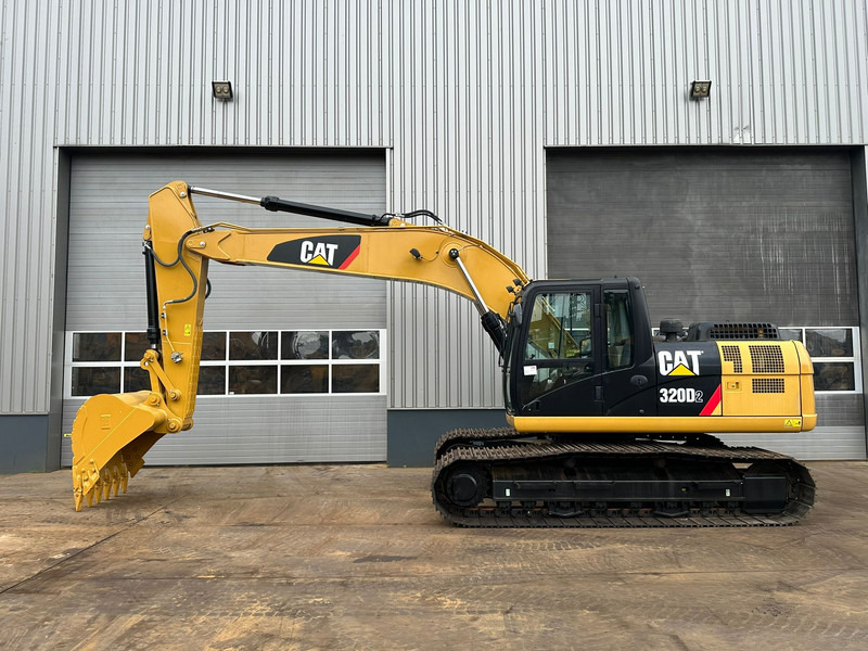 Caterpillar 320D2 - Paletli ekskavatör: fotoğraf 1 Caterpillar 320D2 - Paletli ekskavatör: fotoğraf 1