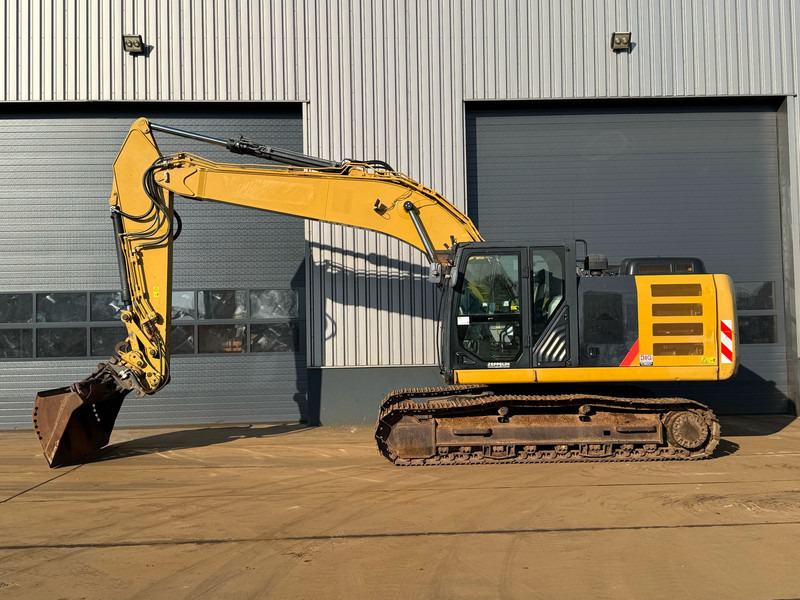 Caterpillar 320EL - Paletli ekskavatör: fotoğraf 1 Caterpillar 320EL - Paletli ekskavatör: fotoğraf 1