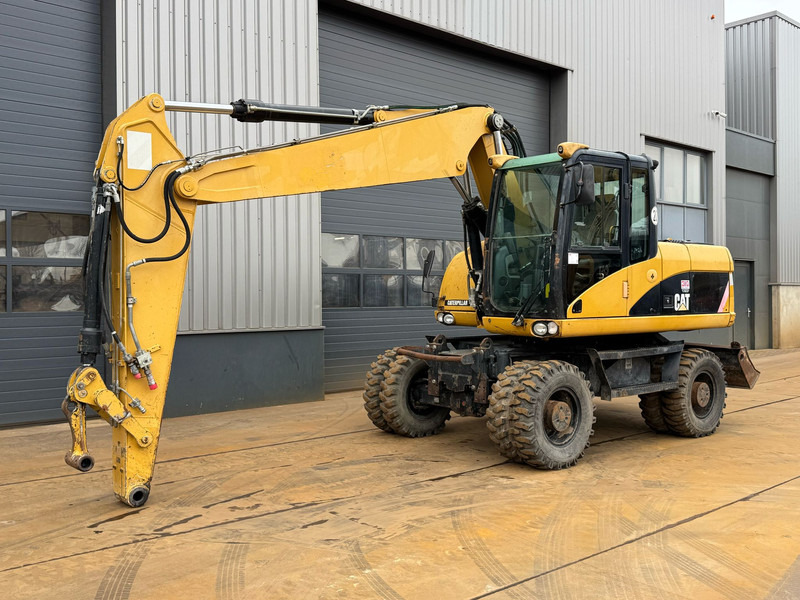 Caterpillar M315D - Tekerlekli ekskavatör: fotoğraf 2 Caterpillar M315D - Tekerlekli ekskavatör: fotoğraf 2