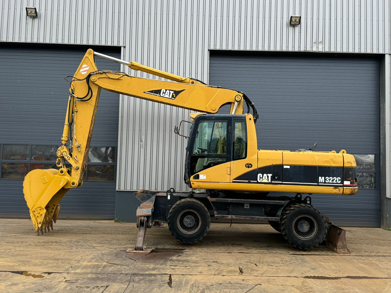 Caterpillar M322C - Hydraulic stabilizers / VA Triple boom / CE-certified, - Tekerlekli ekskavatör: fotoğraf 1 Caterpillar M322C - Hydraulic stabilizers / VA Triple boom / CE-certified, - Tekerlekli ekskavatör: fotoğraf 1