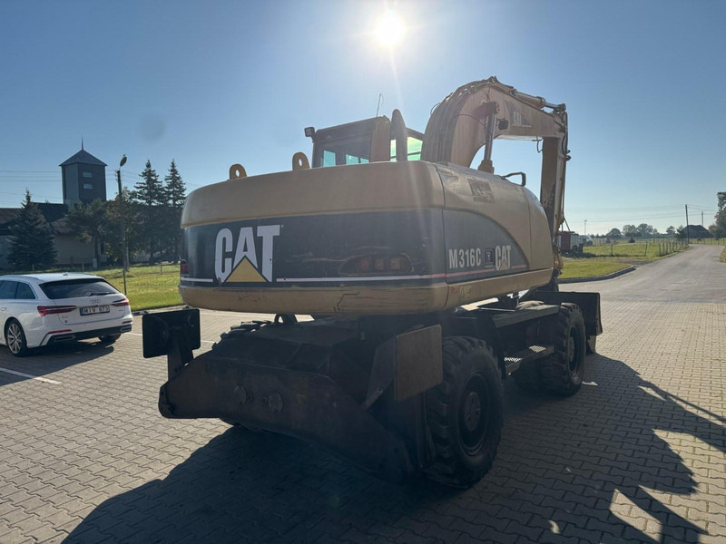 Caterpillar M 316 C - Tekerlekli ekskavatör: fotoğraf 3 Caterpillar M 316 C - Tekerlekli ekskavatör: fotoğraf 3