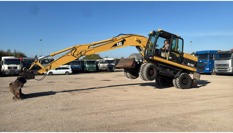 Caterpillar M 316 C - Tekerlekli ekskavatör: fotoğraf 5 Caterpillar M 316 C - Tekerlekli ekskavatör: fotoğraf 5