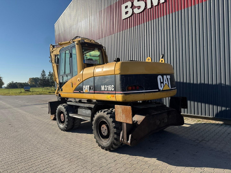 Caterpillar M 316 C - Tekerlekli ekskavatör: fotoğraf 4 Caterpillar M 316 C - Tekerlekli ekskavatör: fotoğraf 4