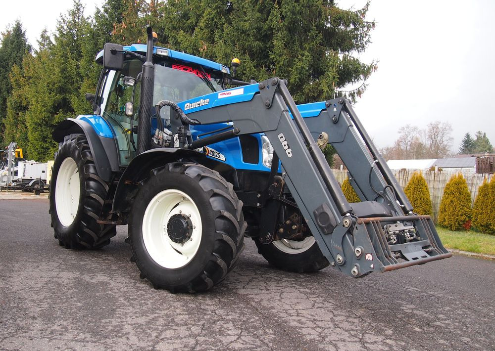Ciągnik New Holland NH TS125A 6 cylindrów 2004 Ciągnik rolniczy New Holland TS125A - Traktör: fotoğraf 2 Ciągnik New Holland NH TS125A 6 cylindrów 2004 Ciągnik rolniczy New Holland TS125A - Traktör: fotoğraf 2
