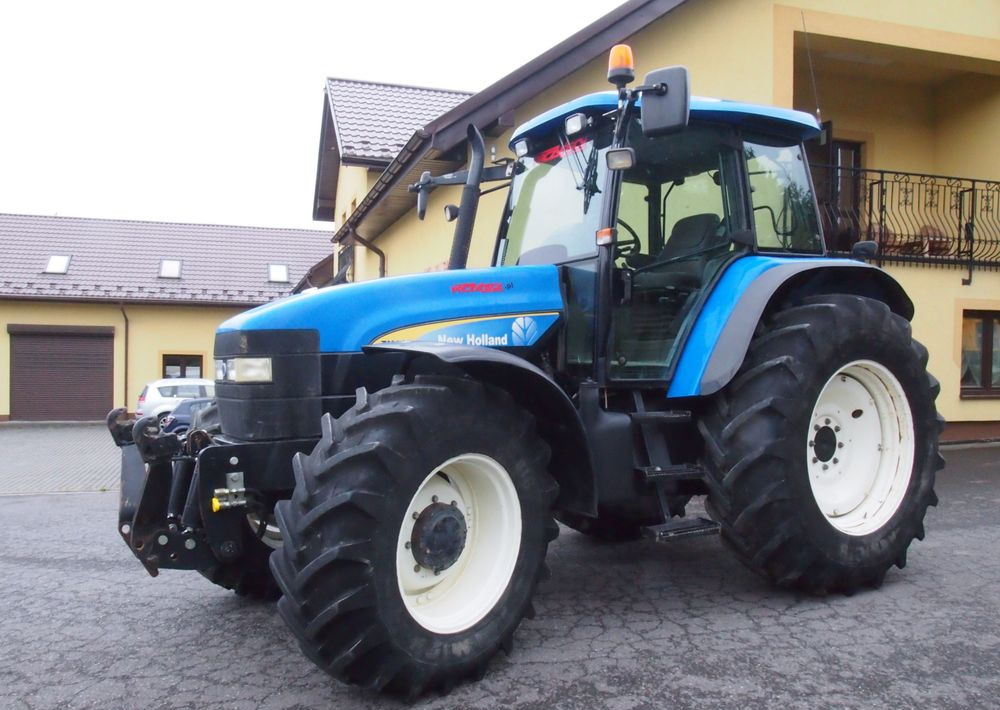 Ciągnik New Holland TM 140 2004 Przedni TUZ - Traktör: fotoğraf 3 Ciągnik New Holland TM 140 2004 Przedni TUZ - Traktör: fotoğraf 3