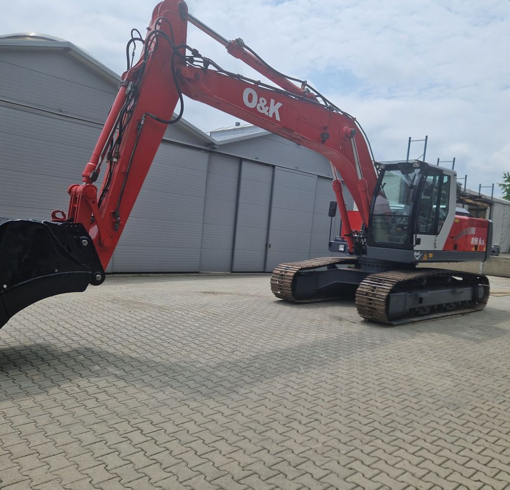 Koparka gąsienicowa O&K RH6,5 2003 Koparka gąsienicowa O&K - Paletli ekskavatör: fotoğraf 1 Koparka gąsienicowa O&K RH6,5 2003 Koparka gąsienicowa O&K - Paletli ekskavatör: fotoğraf 1