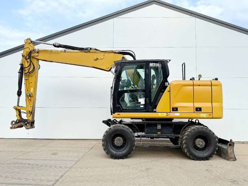 Cat M314 next gen - Triple Boom / Automatic Greasing - Tekerlekli ekskavatör: fotoğraf 1 Cat M314 next gen - Triple Boom / Automatic Greasing - Tekerlekli ekskavatör: fotoğraf 1