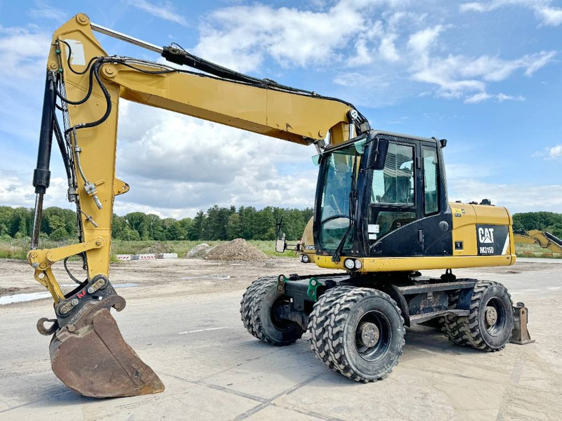 Cat M315D - Triple Boom / Quick Coupler - Tekerlekli ekskavatör: fotoğraf 2 Cat M315D - Triple Boom / Quick Coupler - Tekerlekli ekskavatör: fotoğraf 2